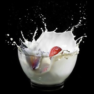 the milk splashing out of the bowl in a still frame photo is known as movement